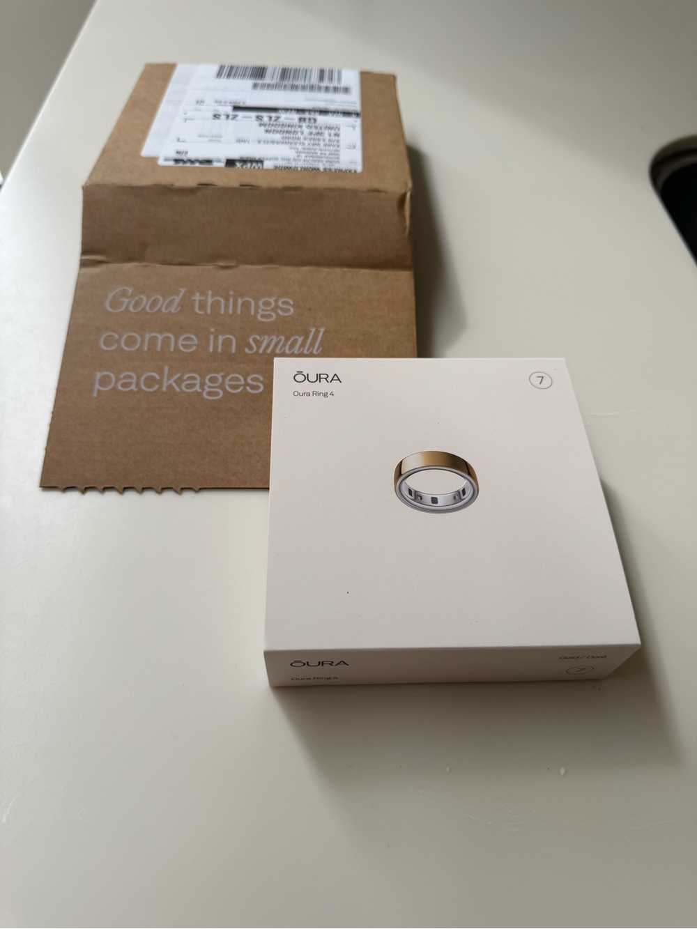 Oura Ring 4 Box with White and Gold Illustration